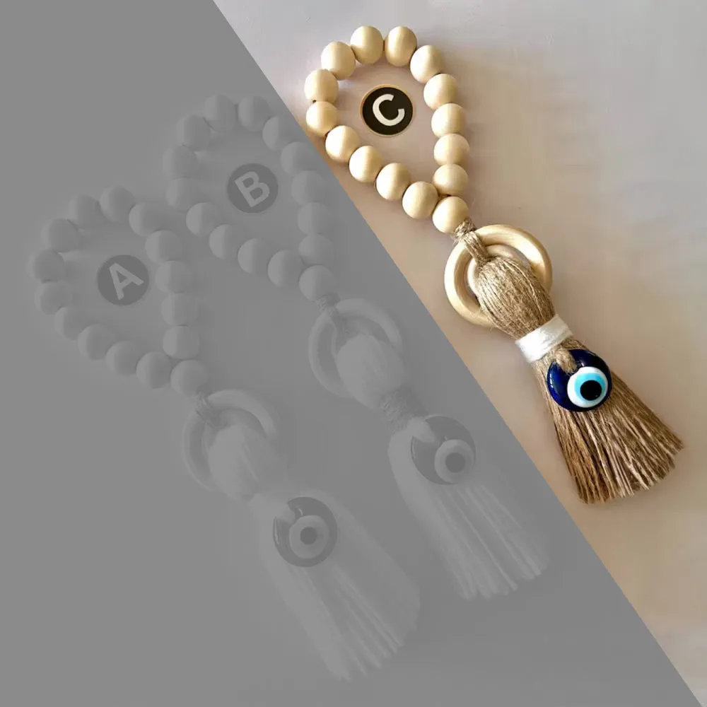 Enchanting Wooden Guardian Amulet Tassel with Glass Evil Eye Bead for Modern Home Décor