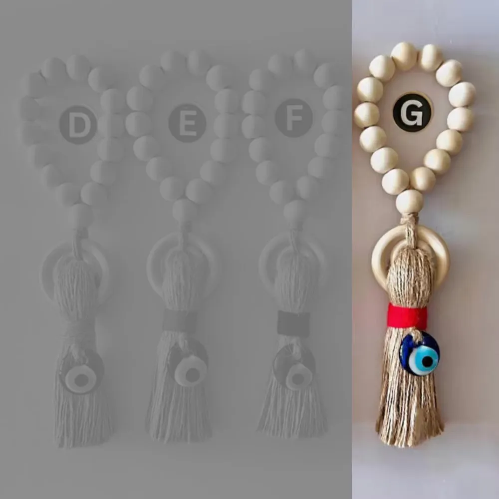 Enchanting Wooden Guardian Amulet Tassel with Glass Evil Eye Bead for Modern Home Décor