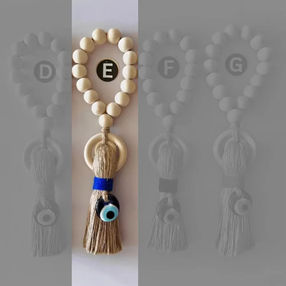 Enchanting Wooden Guardian Amulet Tassel with Glass Evil Eye Bead for Modern Home Décor