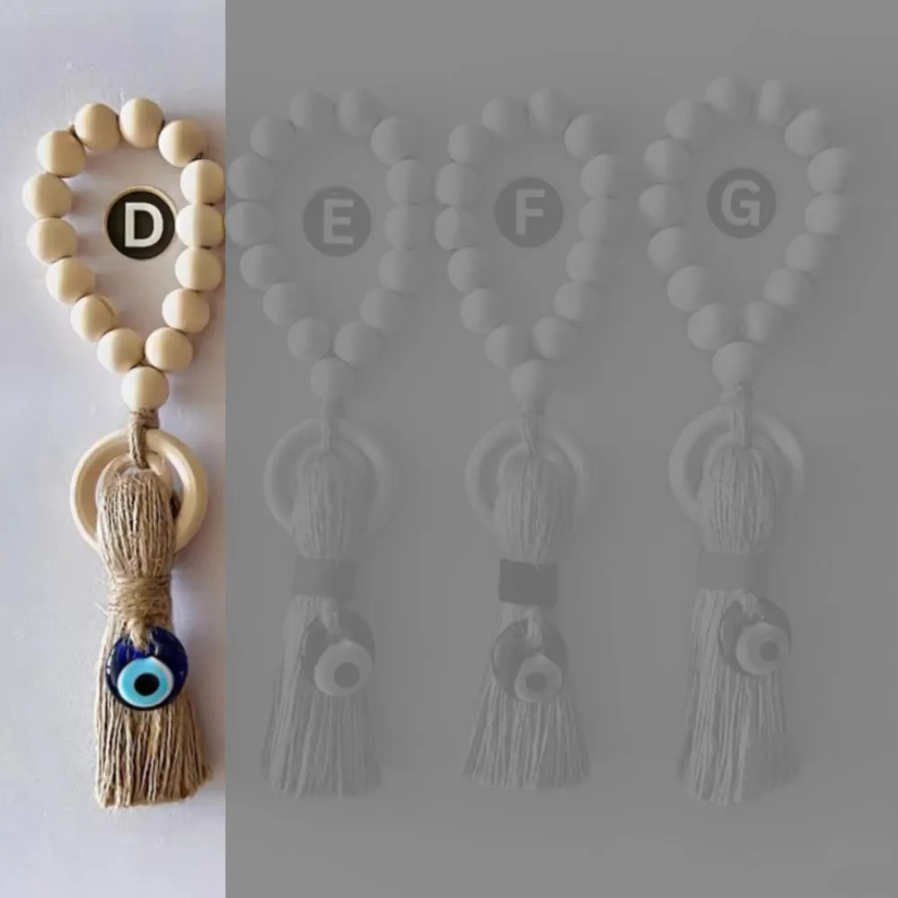 Enchanting Wooden Guardian Amulet Tassel with Glass Evil Eye Bead for Modern Home Décor