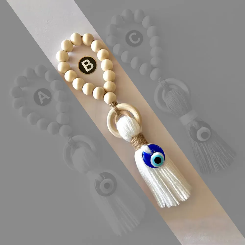 Enchanting Wooden Guardian Amulet Tassel with Glass Evil Eye Bead for Modern Home Décor