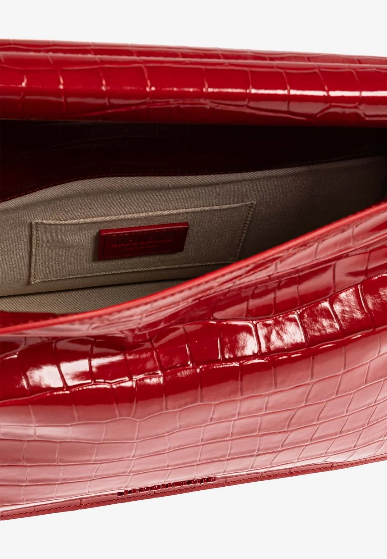The Rond Carré Croc-Embossed Leather Clutch